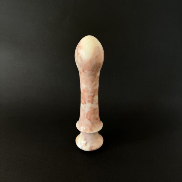 Cherry marble dildo side profile — red stone luxury adult toy