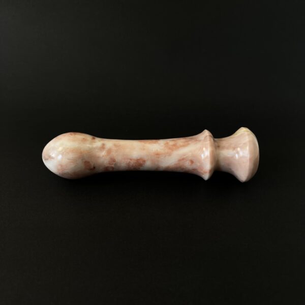 Cherry marble dildo red veining close up — rare stone sex toy