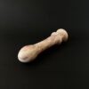 Cherry red marble dildo texture — handcrafted stone intimate object