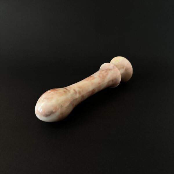 Cherry red marble dildo texture — handcrafted stone intimate object