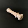 Cherry marble dildo angle view — luxury red stone sex toy