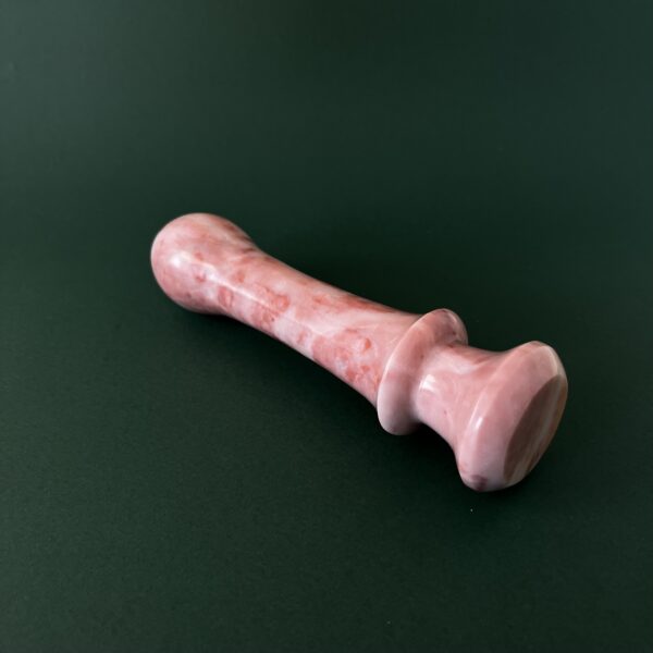 Cherry marble dildo shaft detail — unique red stone sex toy