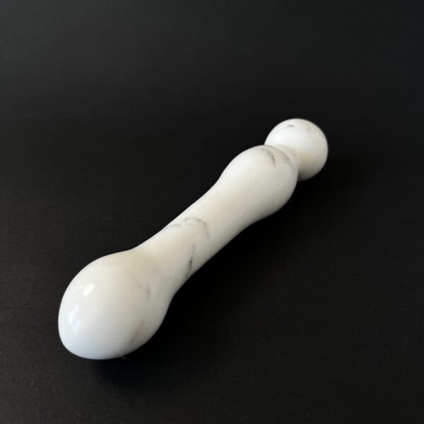 White marble dildo veining close up — unique natural stone adult toy