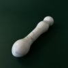 White marble stone dildo lifestyle image — luxury adult toy photography