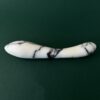 White marble g-spot dildo side view — natural stone luxury adult toy