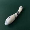 White marble g-spot stimulator detail — hand-carved stone intimate object
