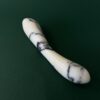 White marble luxury dildo texture detail — natural stone adult toy