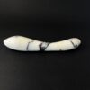 Curved marble dildo profile view — luxury stone g-spot toy