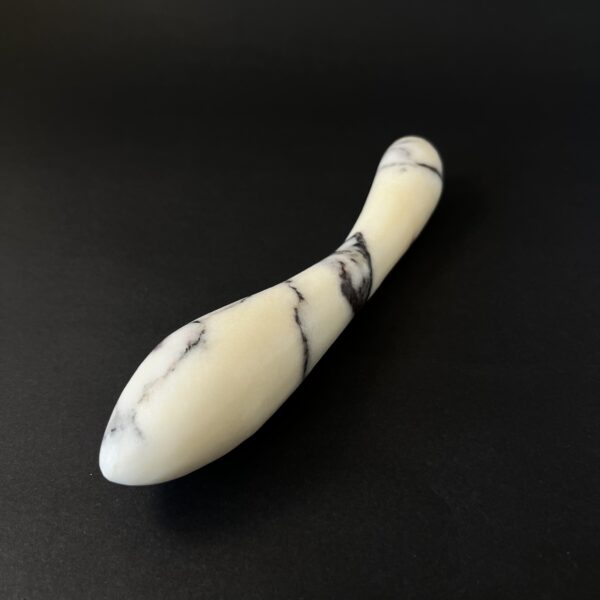 White marble g-spot sex toy angled view — handcrafted stone dildo